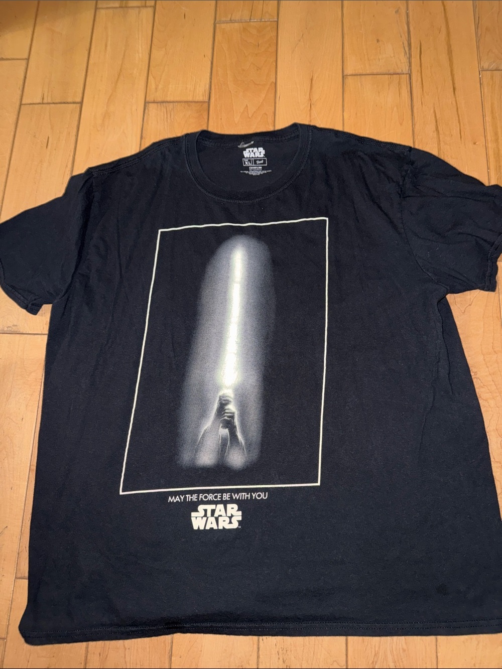 Star Wars Men’s Black T-Shirt with White Lightsaber Graphic